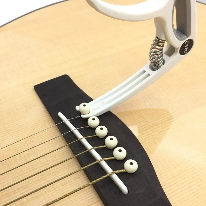 Plastic Guitar Capo for 6 Stri - Musical Instrument Sounds recension och pris